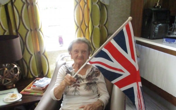 Resident with Flag in hand